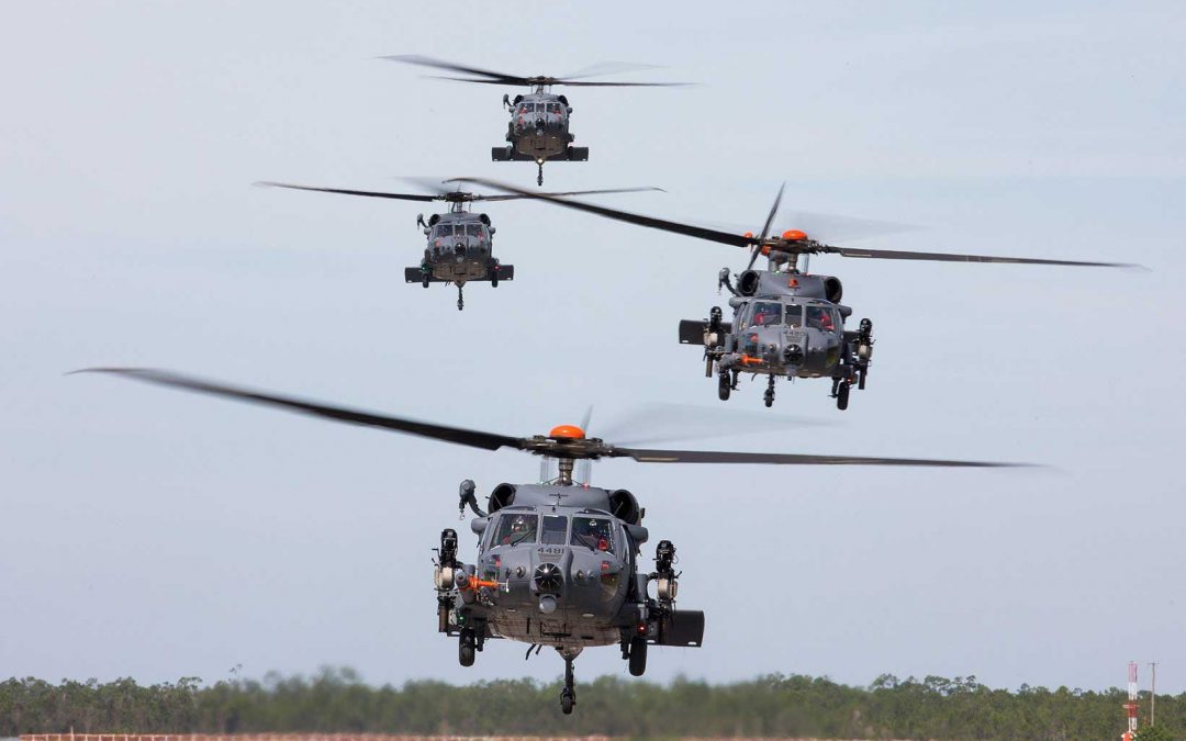 Four choppers getting ready to land